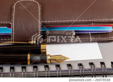 Fountain pen  on notebook 26979588