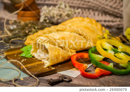 Pastry stuffed with minced meat 26980078