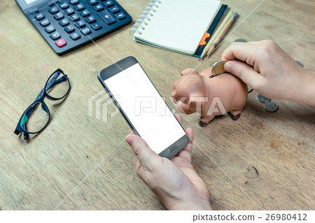 Human hand holding mobile smart phone Human hand holding mobile smart phone 26980412