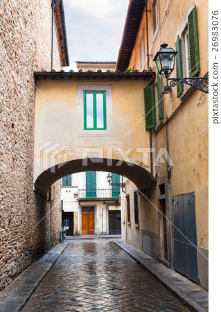 arch on old street in Florence city in autumn 26983076