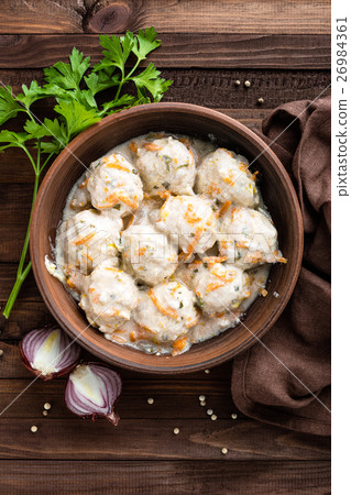 meatballs in cream sauce 26984361