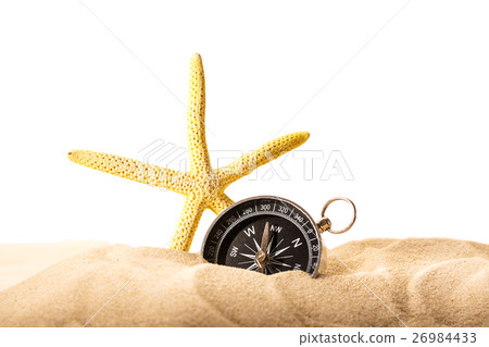 Fingerfish and compass in sand 26984433