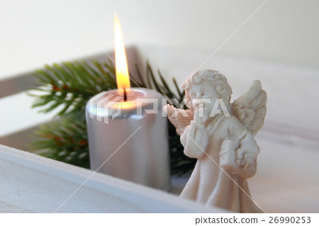 Candle with angel 26990253