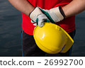 Harbour docker worker waiting for a ship, sea wave 26992700
