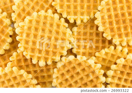Bunch of golden baked waffle cookies Bunch of golden baked waffle cookies 26993322