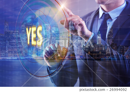 Businessman pressing virtual button YES Businessman pressing virtual button YES 26994092