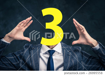 A businessman with a face with numbers 26995558