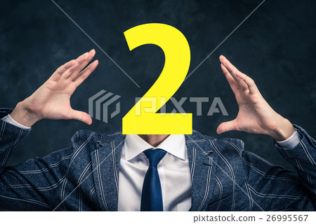 A businessman with a face with numbers A businessman with a face with numbers 26995567