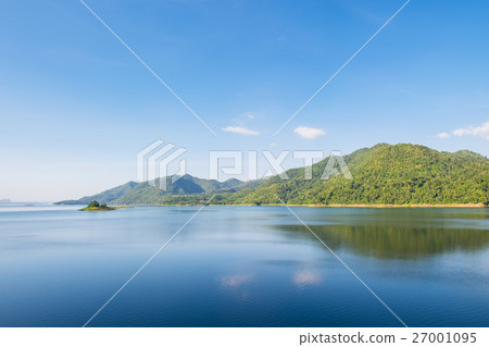 Blue sky reflection and mountain on dam Blue sky reflection and mountain on dam 27001095