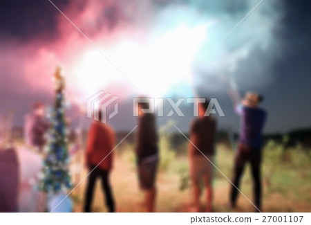Blurred scene friend celebration playing sparkler Blurred scene friend celebration playing sparkler 27001107