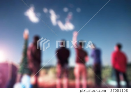 Blurred scene group of friends celebrating Blurred scene group of friends celebrating 27001108