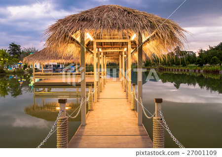 Pavilion straw thatch bridge way middle lake Pavilion straw thatch bridge way middle lake 27001109