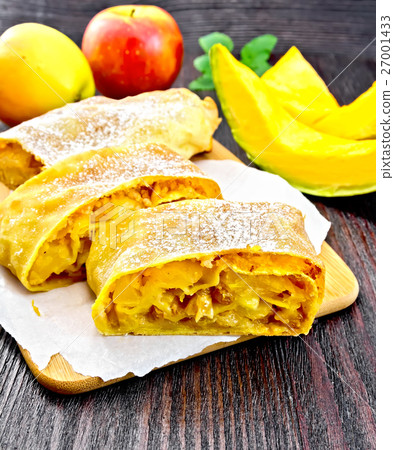 Strudel pumpkin and apple with raisins on board 27001433