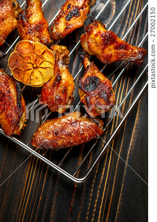 Grilled chicken wings on the grill Grilled chicken wings on the grill 27002150