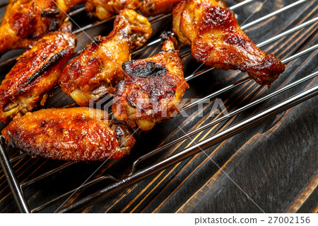 Grilled chicken wings on the grill Grilled chicken wings on the grill 27002156