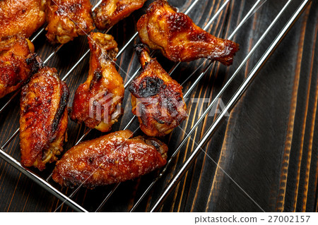 Grilled chicken wings on the grill Grilled chicken wings on the grill 27002157
