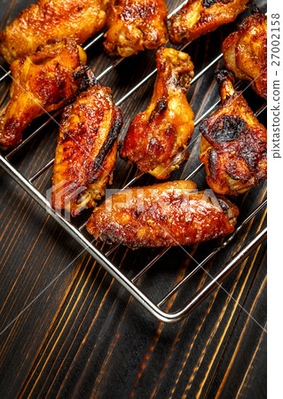 Grilled chicken wings on the grill Grilled chicken wings on the grill 27002158