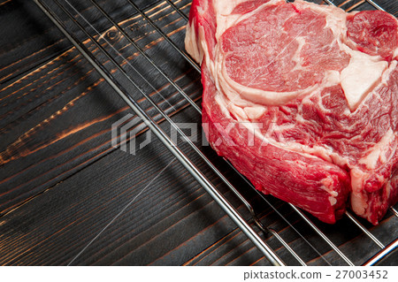 Uncooked organic shin of beef meat Uncooked organic shin of beef meat 27003452