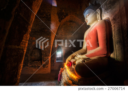 Mini Monk in meditation inside temple 27006714