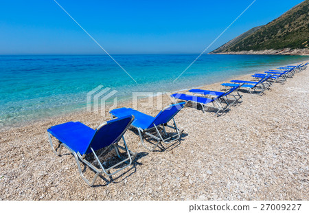 Summer morning beach. 27009227