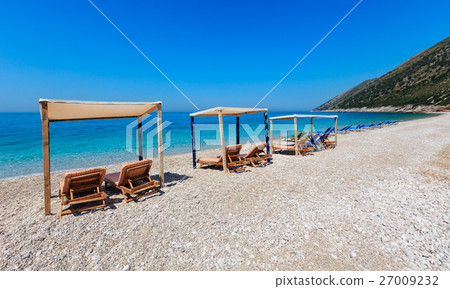 Summer morning beach. 27009232