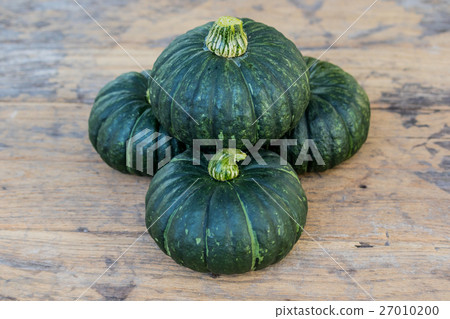 Japanese pumpkin on wooden board 27010200