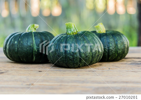 Japanese pumpkin on wooden board Japanese pumpkin on wooden board 27010201