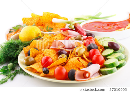 Nachos, olives, pork loin and vegetables Nachos, olives, pork loin and vegetables 27010903