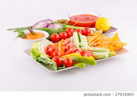 Vegetables, olives, nachos, red and cheese sause Vegetables, olives, nachos, red and cheese sause 27010905
