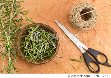 rosemary in a coconut shell 27011253