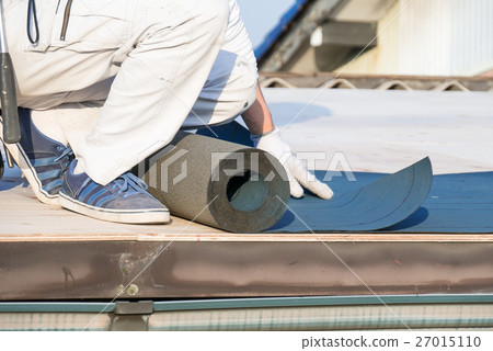 Roof construction craftsman sticking waterproof sheet 27015110