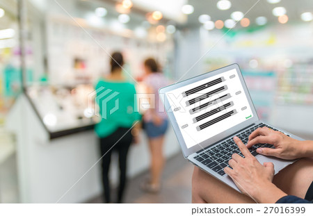 showing the chat message for Shopping Online With Digital laptop on Abstract blurred photo of department store bokeh background, technology and internet concept showing the chat message for Shopping Online With Digital laptop on Abstract blurred photo of department store bokeh background, technology and internet concept 27016399