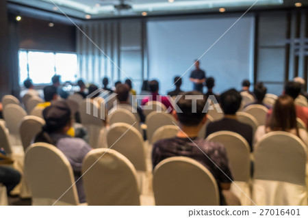 Abstract blurred photo of conference hall or seminar room with attendee background Abstract blurred photo of conference hall or seminar room with attendee background 27016401