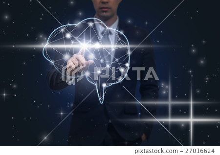 Businessman hand pointing the brain on dark background, technology and healthty concept 27016624