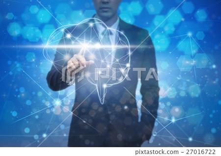 Businessman hand pointing the brain over the Abstract Hexagon bokeh background on blue color background, technology and healthty concept Businessman hand pointing the brain over the Abstract Hexagon bokeh background on blue color background, technology and healthty concept 27016722