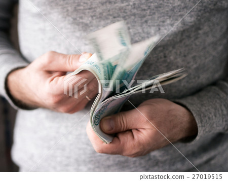 Hands counting rubles Hands counting rubles 27019515