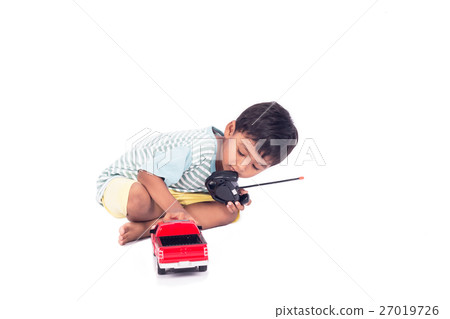 Cute asian child little boy lying play toy car 27019726