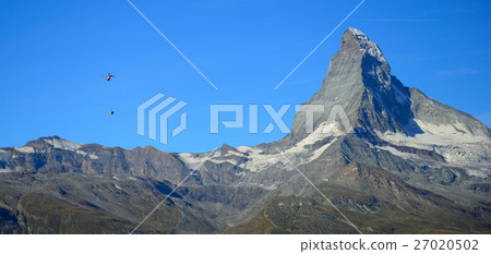 Helicopter is external load flying near Matterhorn 27020502