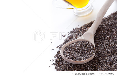 Chia seeds in spoon on white Chia seeds in spoon on white 27020669