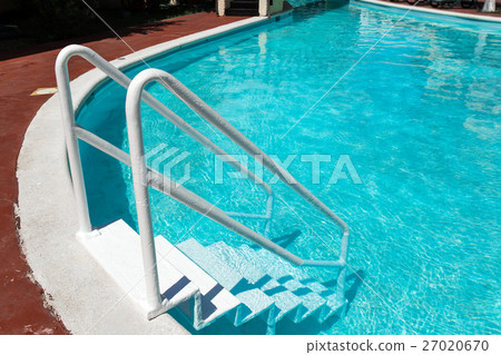 Grab bars ladder in swimming pool Grab bars ladder in swimming pool 27020670