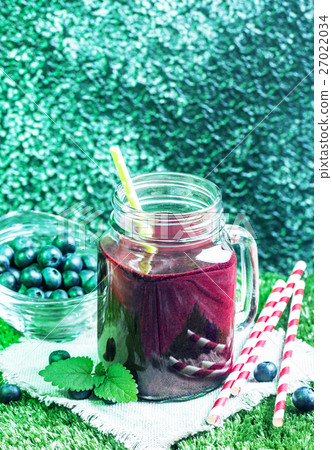 Blueberry smoothie in a glass 27022034