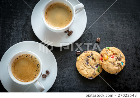 Two cups of coffee with  cookies 27022548