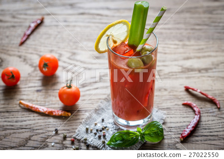 Bloody Mary cocktail on the wooden background 27022550