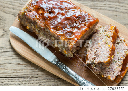 Meat loaf with barbecue sauce on the wooden board 27022551