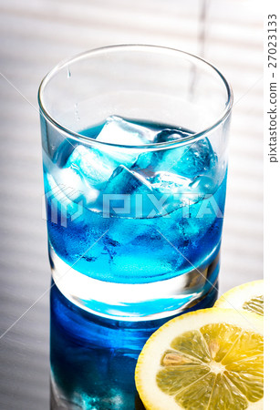 Glass of blue curacao cocktail Glass of blue curacao cocktail 27023133