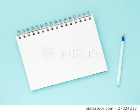 blank note paper on blue background 27024218