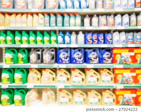 Blurred colorful motor oil bottles 27024222