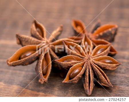 Star anise on wooden background Star anise on wooden background 27024257