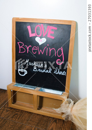 Blackboard with lettering 'Love Brewing' stands Blackboard with lettering 'Love Brewing' stands 27031393