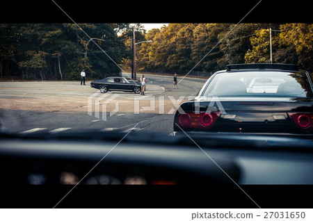 Look from behind at old American car standing  27031650